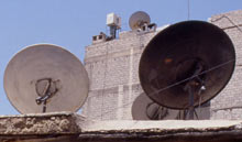 We can tell how old our newspapers are by looking at the satellite dishes on our roofs