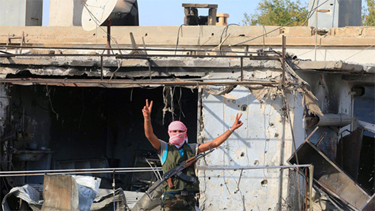 //A syrian rebel in Tel Abyad (AP)